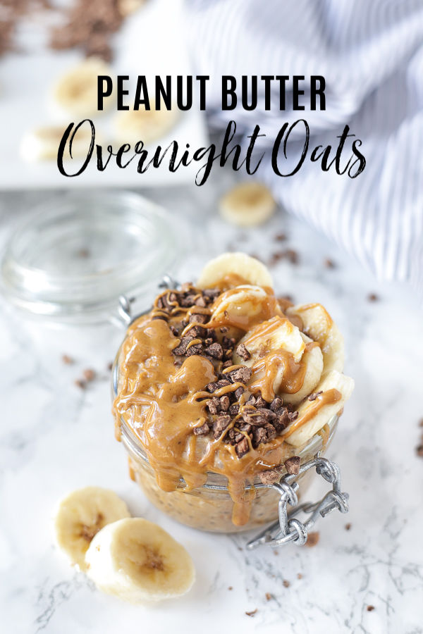 peanut butter overnight oats in a glass jar topped with bananas, chocolate, and peanut butter drizzle.