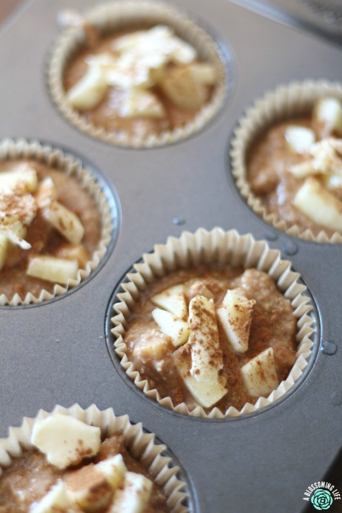 gluten free apple muffin batter in muffin tin ready to be backed