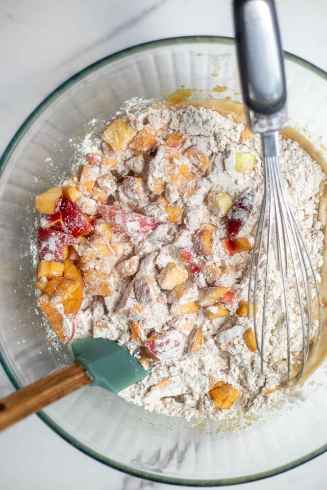 Dry ingredients added to wet ingredients and chopped apples to the flour.