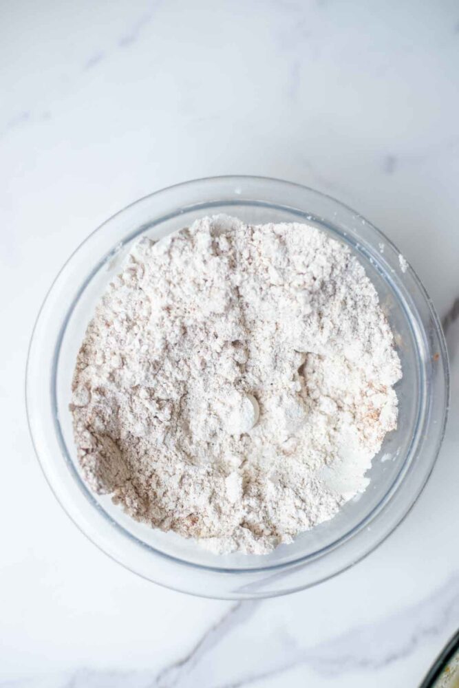 dry ingredients mixed together in a glass bowl.