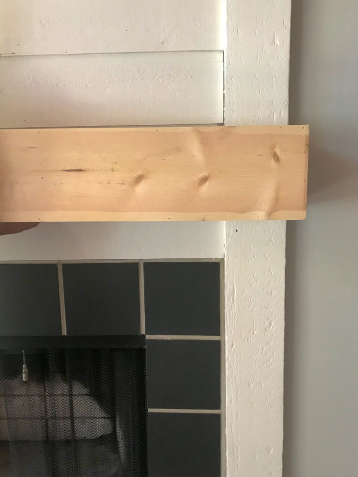 dry fitting DIY Fireplace mantel into place