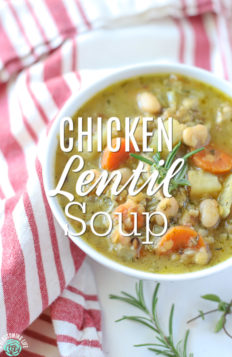 Bowl of hearty chicken lentil soup with carrots, beans, and celery.