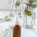 diy toner in a amber bottle with lavender and eucalyptus around it