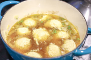 gluten free chicken and dumplings cooking in a dutch oven
