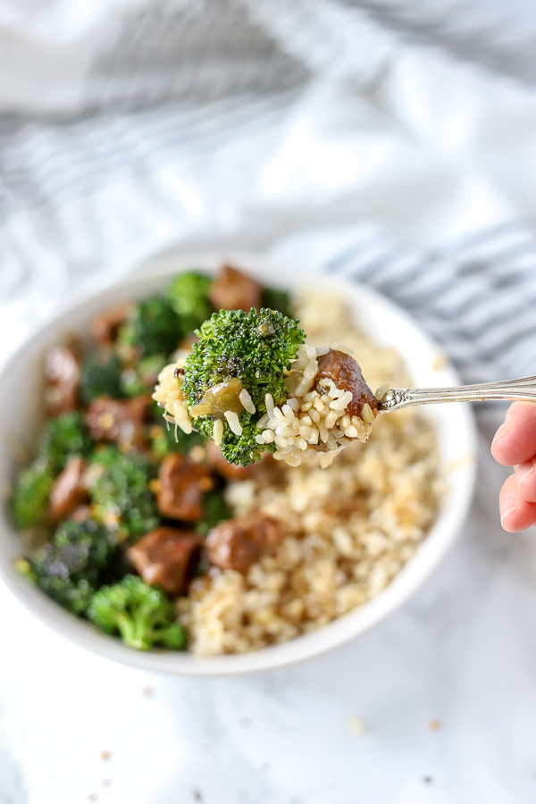 fork holding beef and broccoli