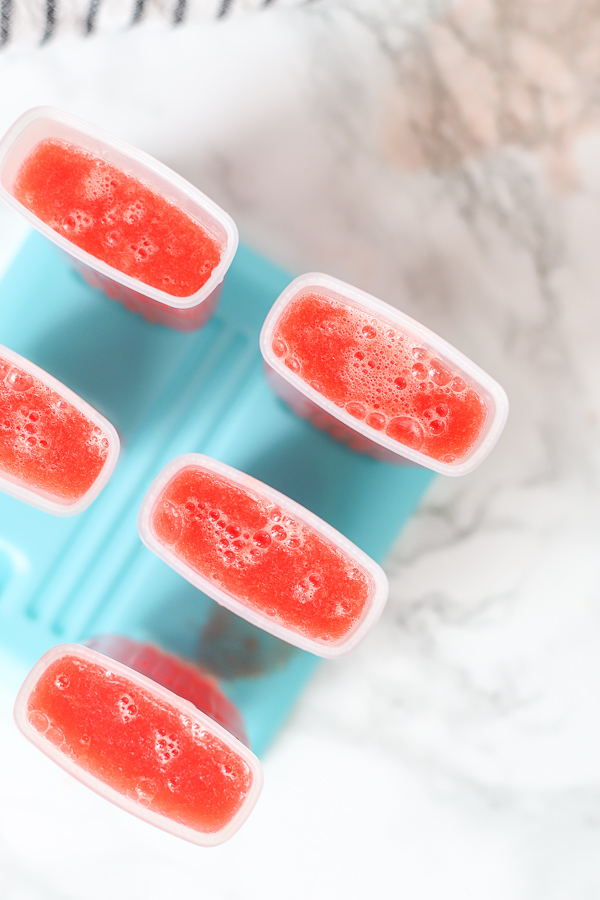 watermelon mixture poured into a popsicle mold