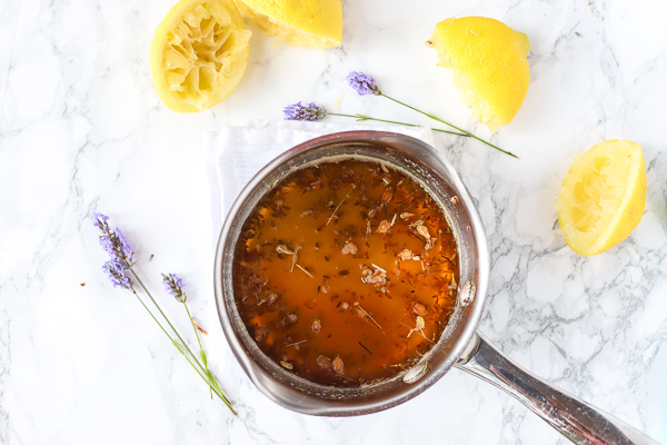 lemon juice, honey, and dried lavender in a saucepan 