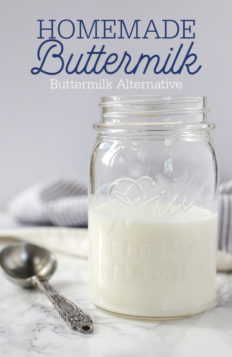 homemade buttermilk in a antique mason jar with a antique measuring spoon to the left