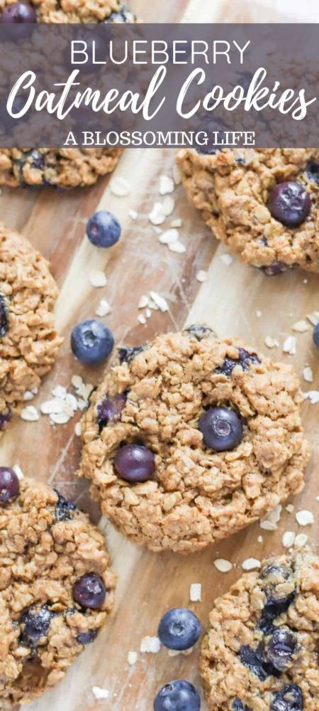 long Pinterest image of blueberry oatmeal cookies on a wood cutting board