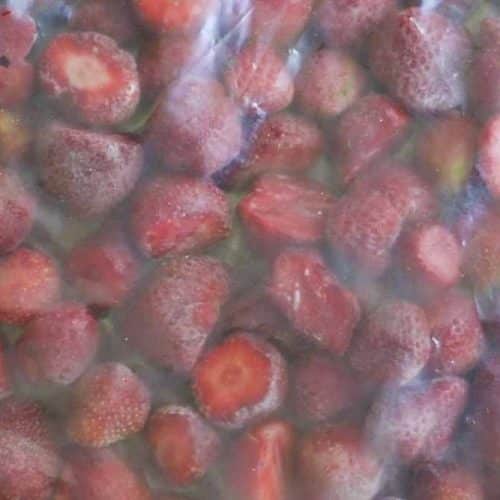 strawberries frozen in a plastic bag