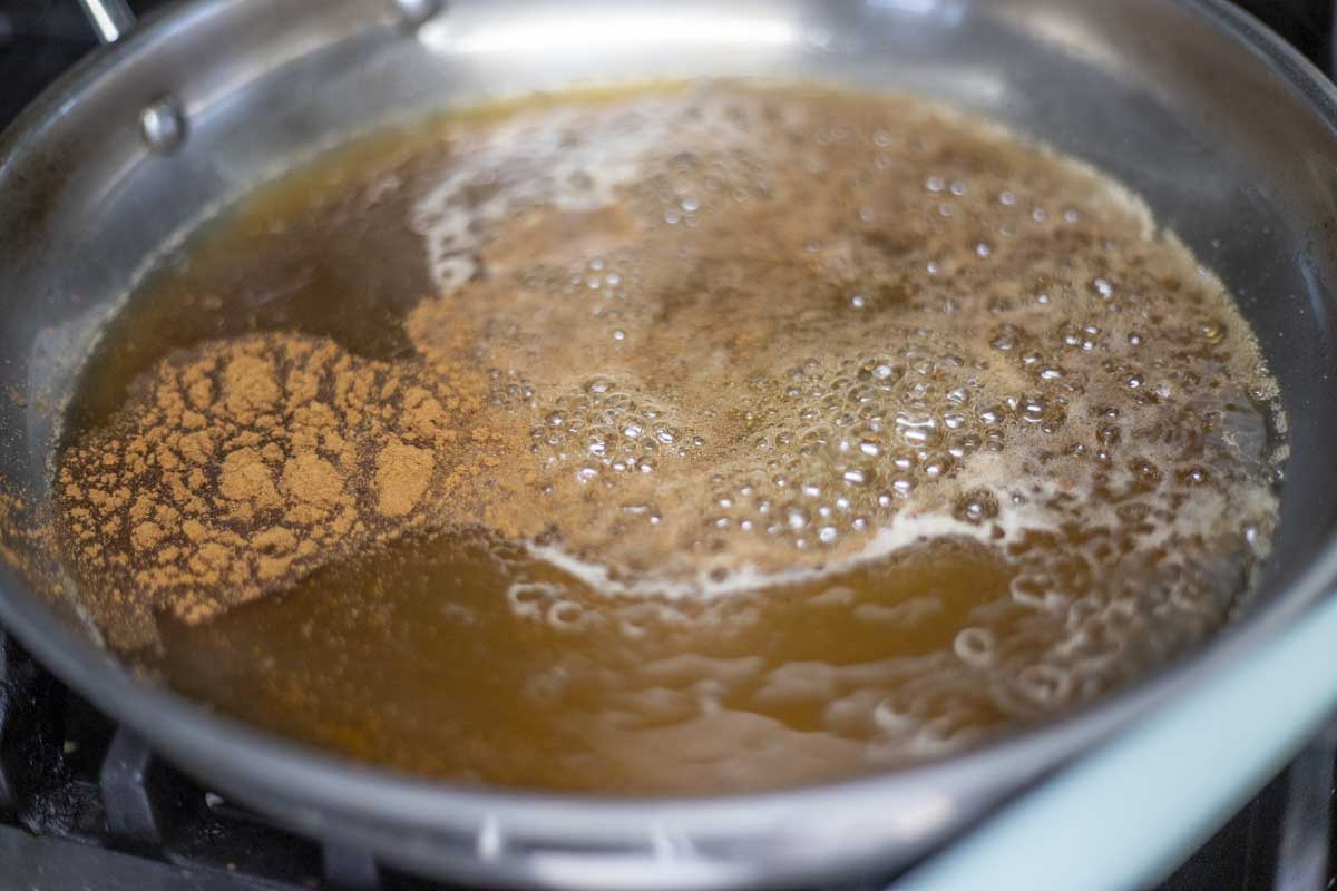 sugar, water, and cinnamon in a skillet.