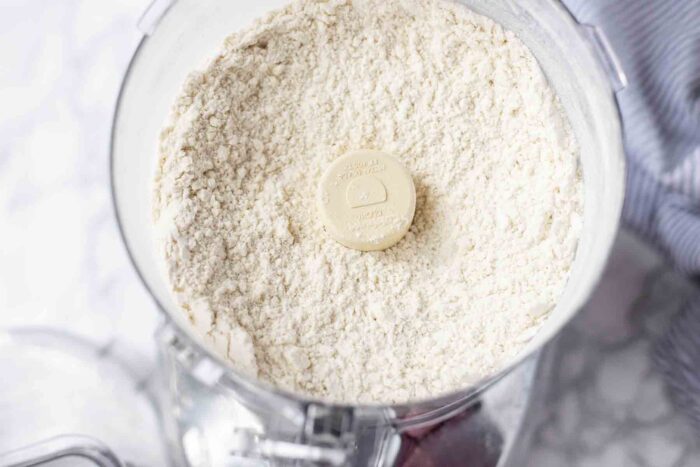 butter and flour mixed together in a food processor.