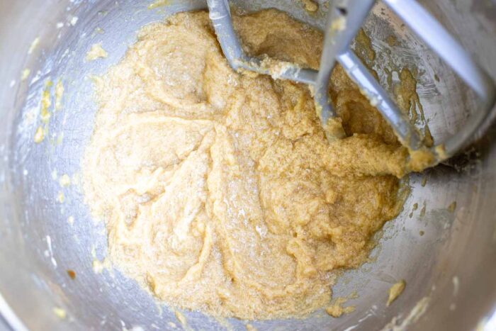 Butter, sugar, egg, vanilla and sourdough discard in a stand mixer bowl.