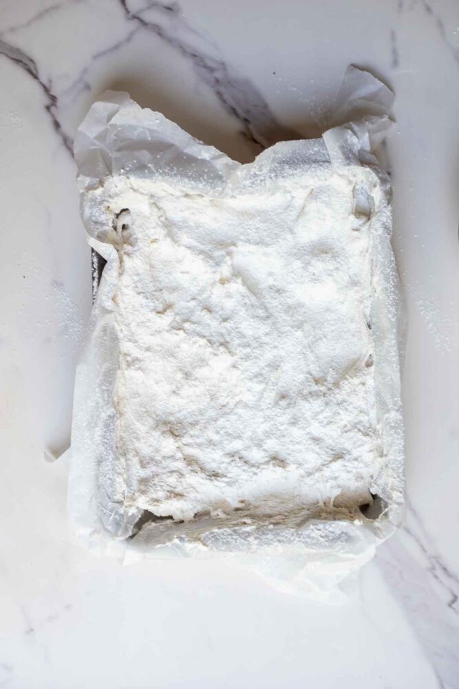 Marshmallows poured into a prepared dish.