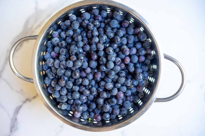 Grapes washed in a colander.