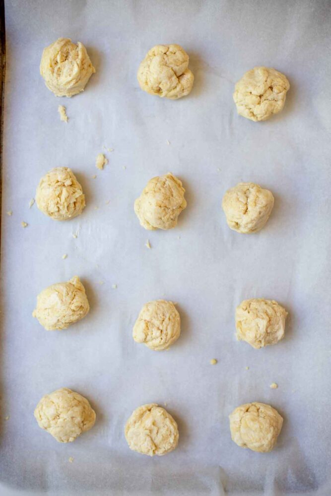 Drop biscuit dough on a parchment lined baking sheet.