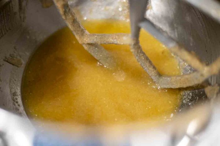 Butter and sugar mixed together in a stand mixer .