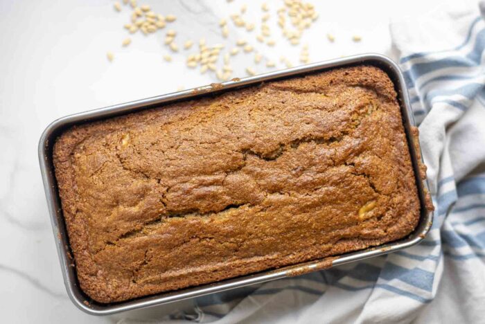 Whole wheat sourdough banana bread baked in a loaf pan.