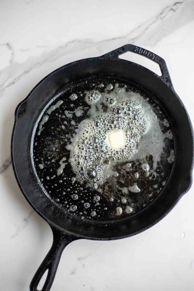 Butter in a cast iron skillet.
