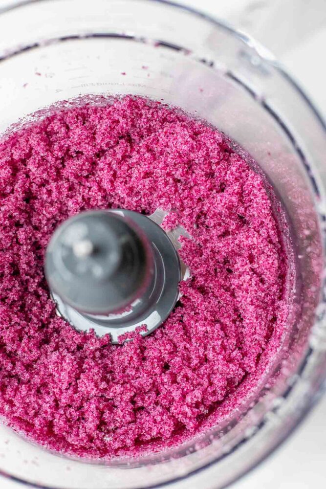 Sugar and roses blended together in a food processor.