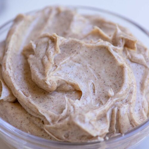 Cinnamon honey butter in a glass bowl.