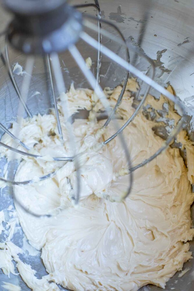 Maple butter whipped together in a bowl with a whisk attachment.