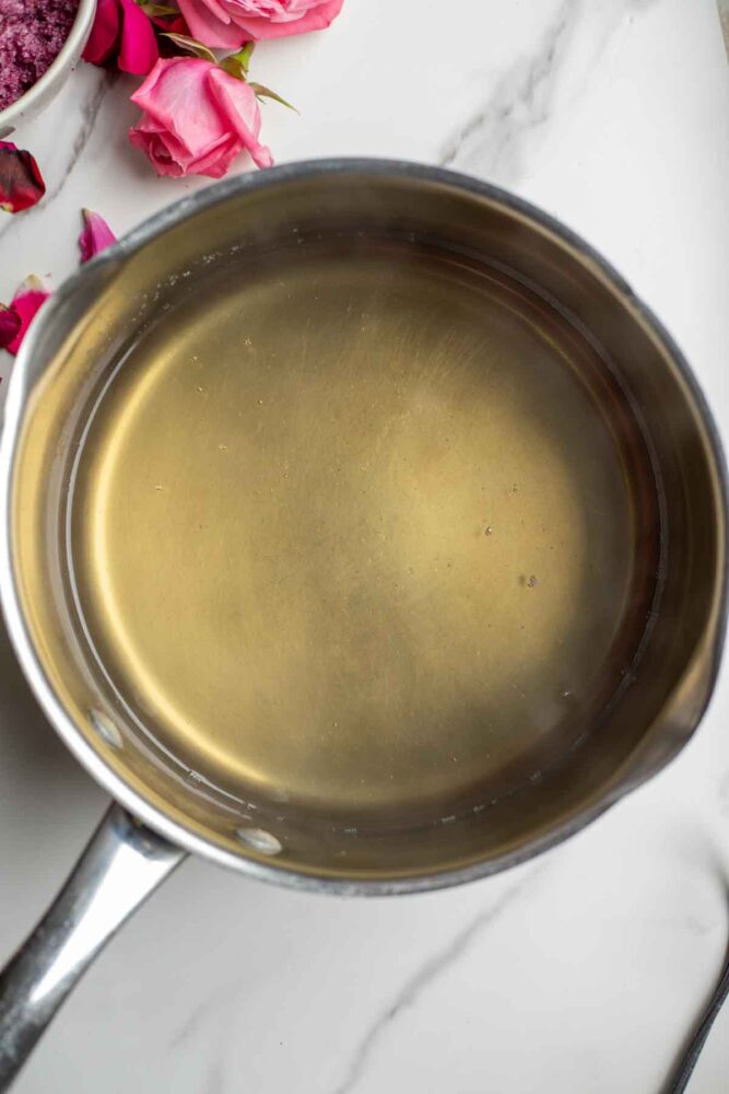 Dissolved sugar water in a saucepan.