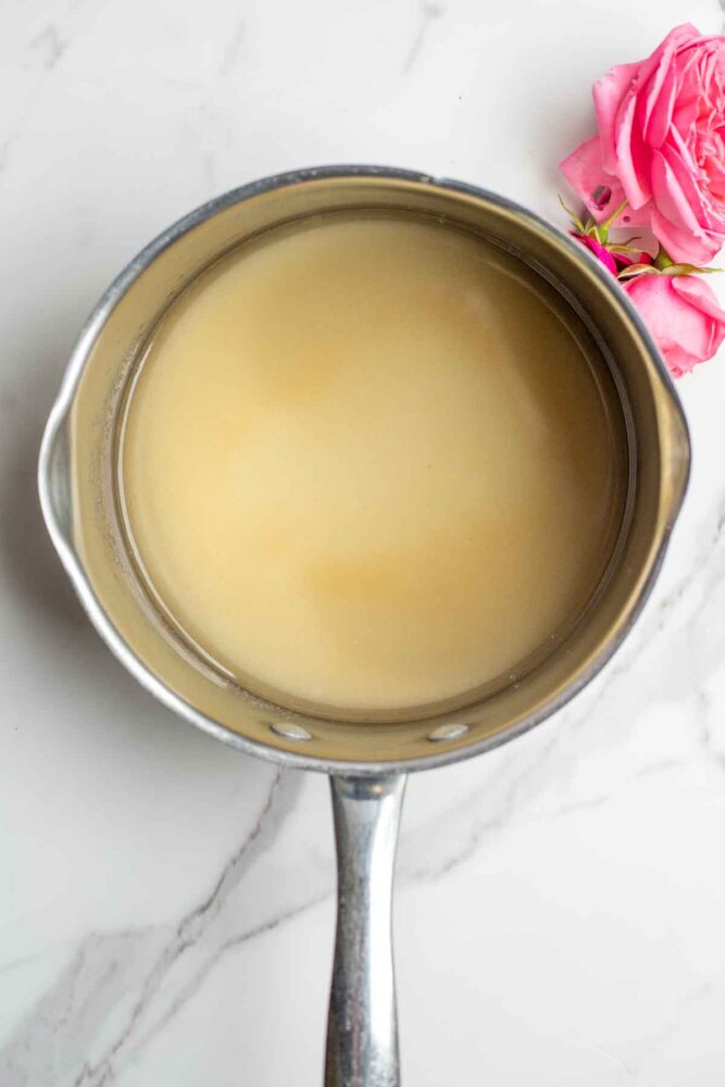 Sugar and water in a saucepan.