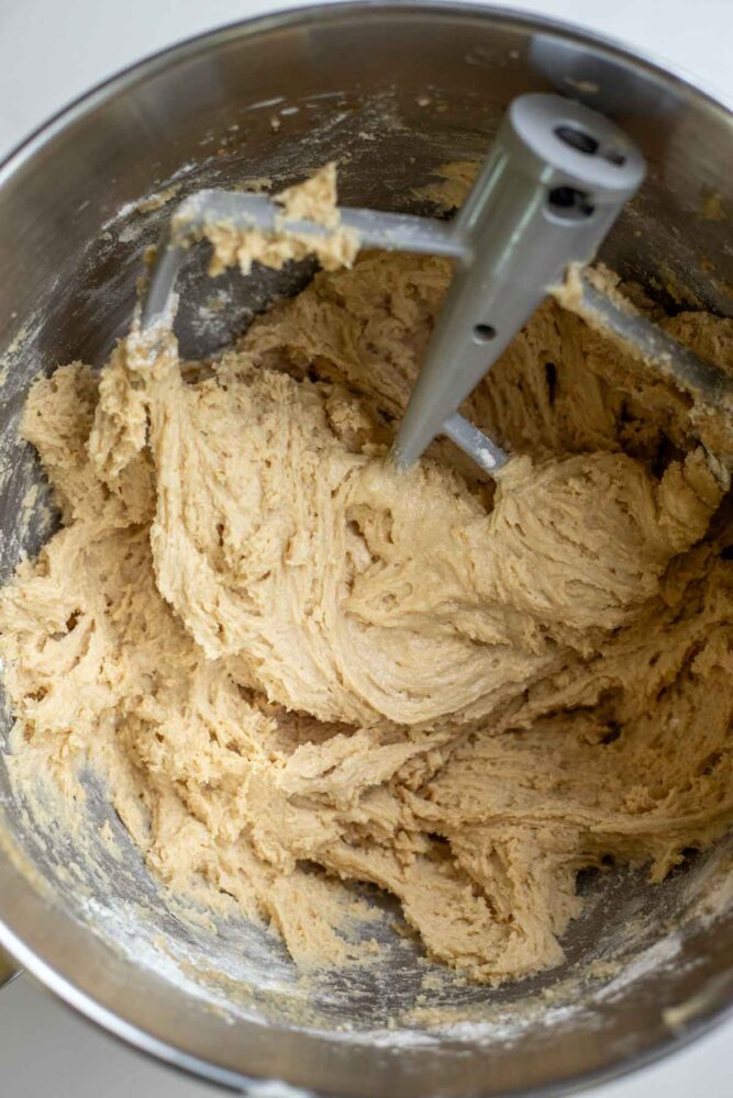 Dry ingredients added to wet ingredients to create cookie dough batter.