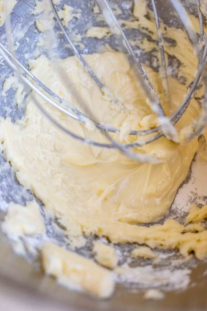 Butter whipped up in a stand mixer bowl.
