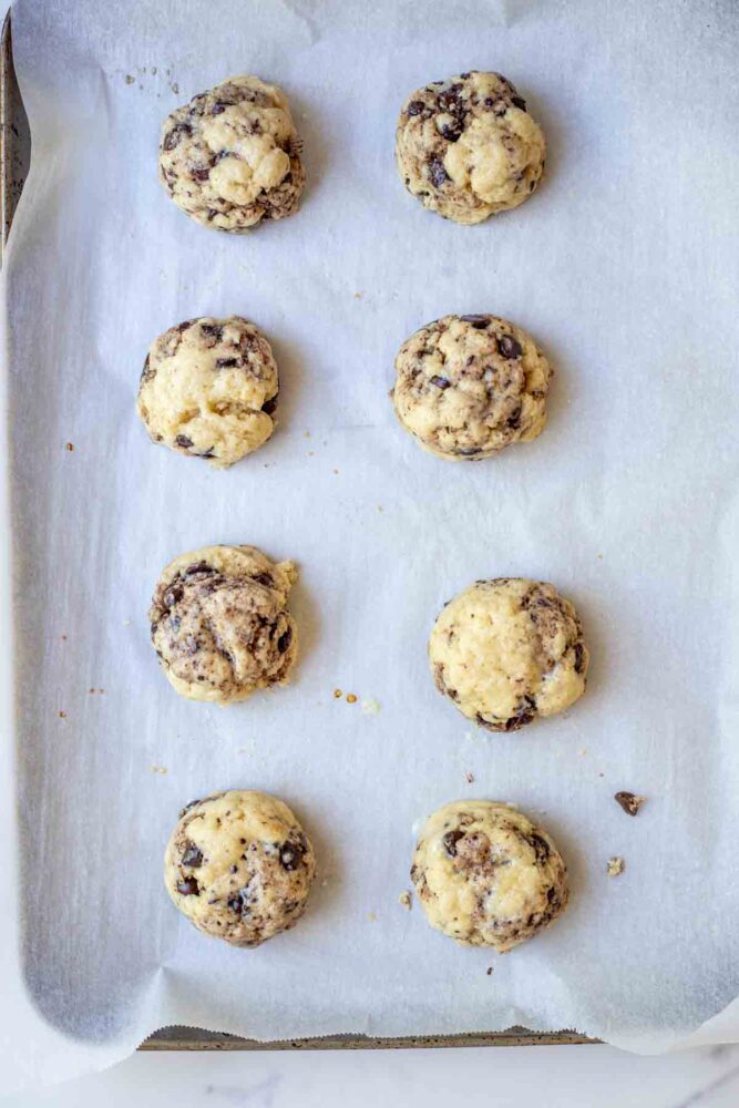 Sourdough chocolate chip scones topped with cream.