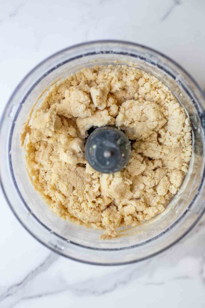 Wet ingredients added to dry ingredients to make scone dough.